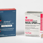 A box of ZIMHI naloxone injection with the device in front of it, next to a box of Narcan naloxone nasal spray with the device beside it.